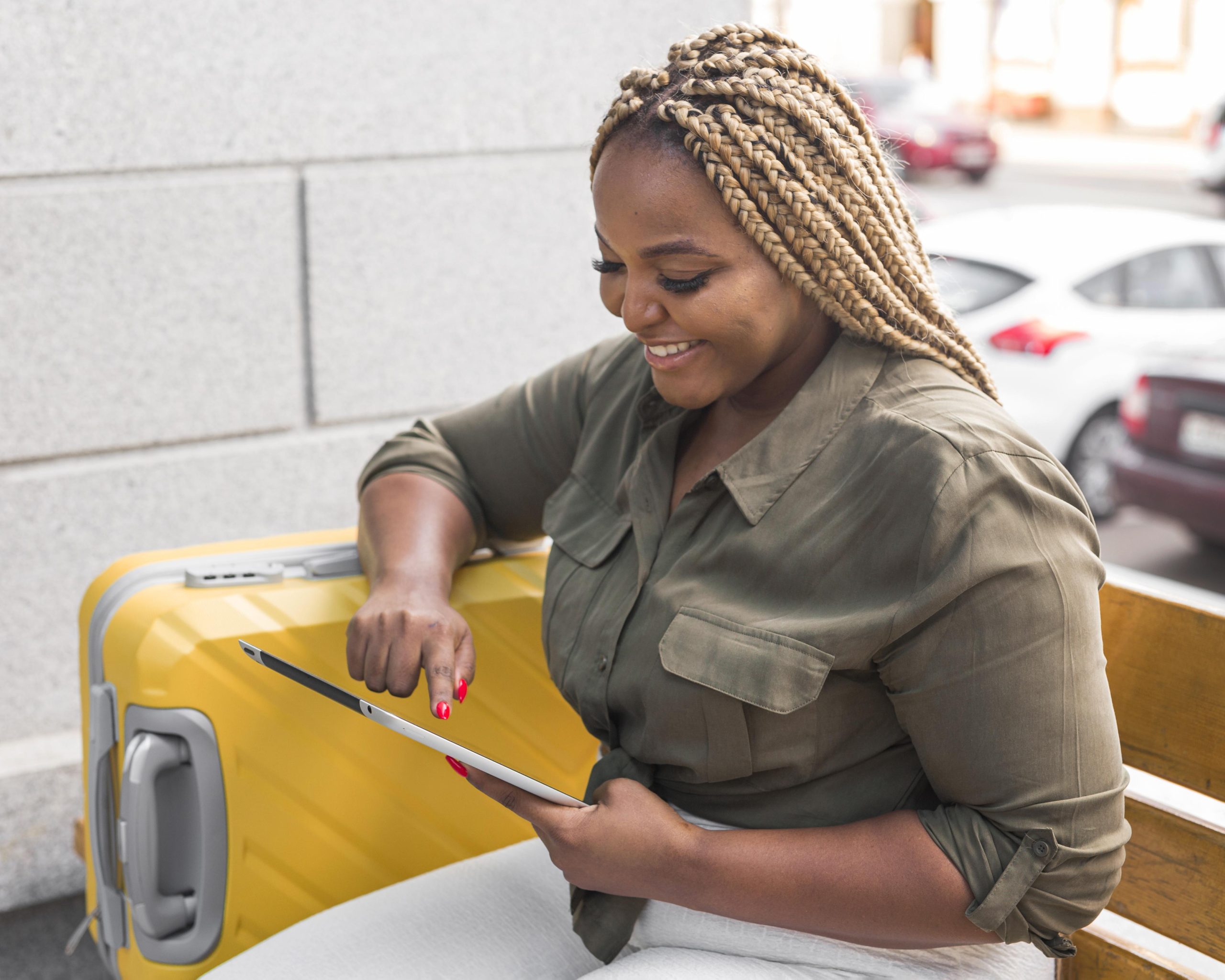 smiley-woman-looking-her-tablet